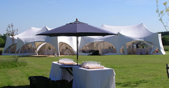 Out Is In marquee at hampagne reception at Rusper in west Sussex